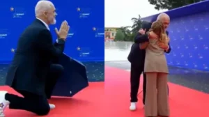 Albanian prime minister Edi Rama kneels with a ‘namaste’ to welcome Italian PM Meloni at Europe