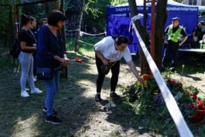 Ukrainians mourn 31 killed in Russian strike on Kyiv