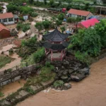 8 dead after flash flood hit campsite in north China, 4 missing