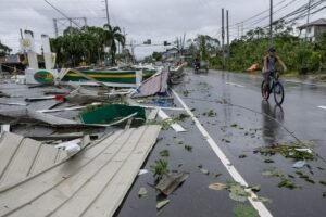 At least two dead, one million evacuated as Typhoon Fung-wong slams into the Philippines