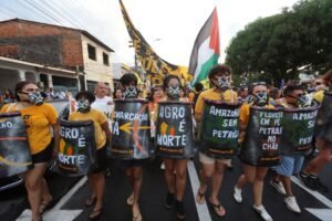 ‘Our land is not for sale’: Indigenous people protest at COP30 in Brazil