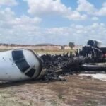 Airjet Angola E145 at Kolwezi on Nov 17th 2025, touched down before runway, aircraft in flames